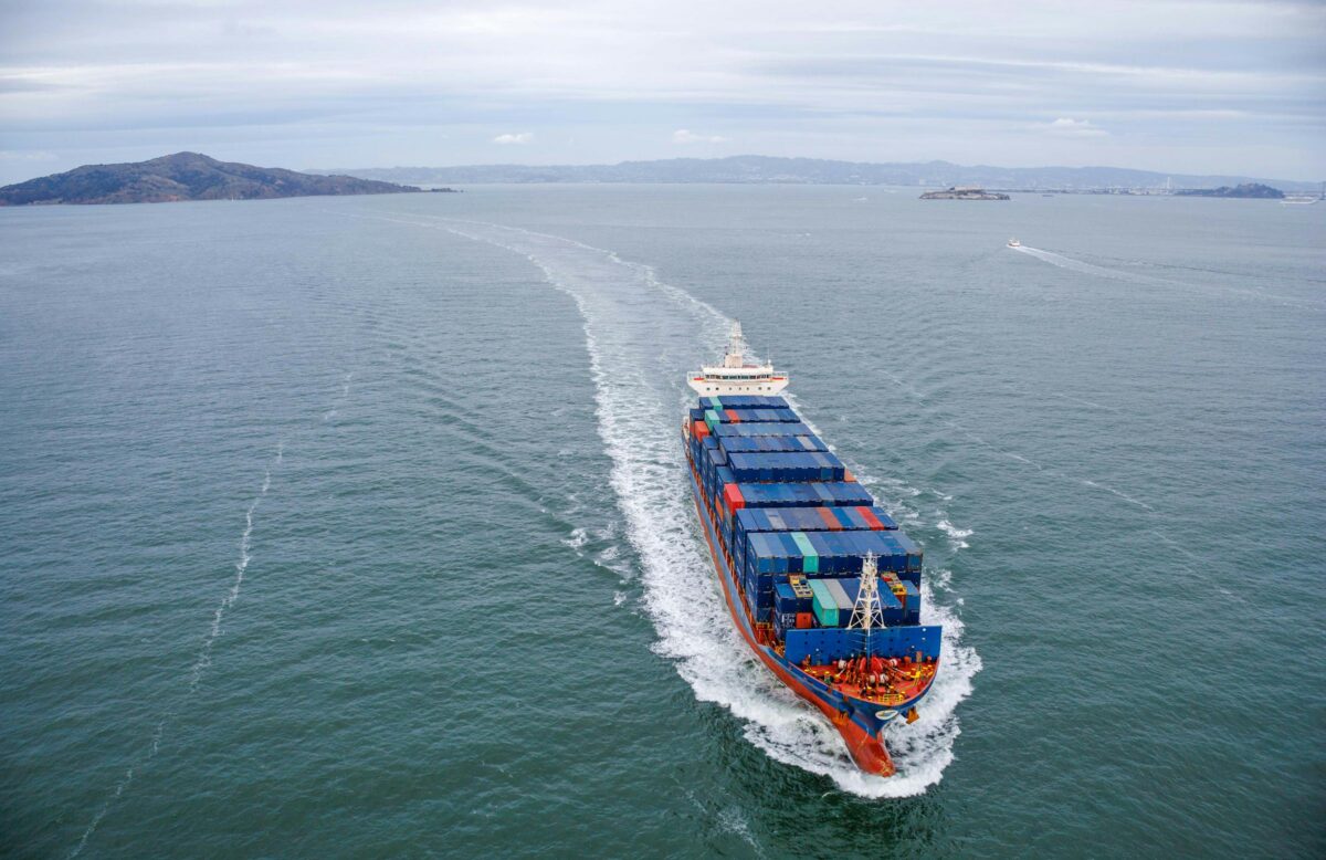 Container ship at sea, viewed from above