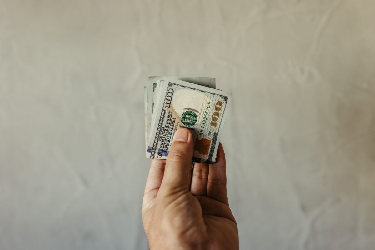 hand with dollars