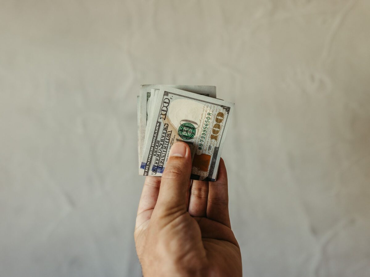 hand with dollars